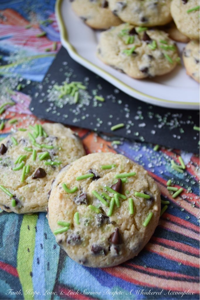 Baileys Cake Mix Chocolate Chip Cookies - Homemade cookies are only one boxed cake mix away, thanks to these chocolate chip cookies, made using Baileys Irish Cream and a few other simple ingredients. Trust me, you're definitely going to want to put a box of white cake mix and a bag of miniature semi-sweet chocolate chips on your grocery list before St. Patrick's Day.