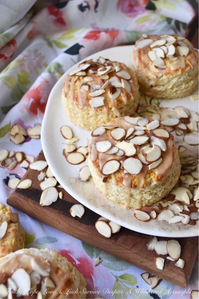 Baileys Irish Cream Almond Scones - A little bit of Baileys Irish Cream and a few sliced almonds give these traditional English scones an extra delicious dose of flavor. It won't matter what time of day you choose to enjoy them, they're a sweet boozy treat you'll always enjoy, whether it be for breakfast, tea, or dessert.