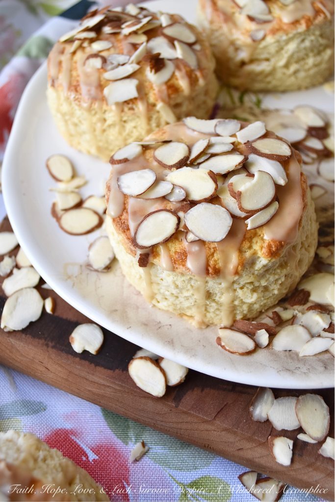 Baileys Irish Cream Almond Scones - A little bit of Baileys Irish Cream and a few sliced almonds give these traditional English scones an extra delicious dose of flavor. It won't matter what time of day you choose to enjoy them, they're a sweet boozy treat you'll always enjoy, whether it be for breakfast, tea, or dessert.