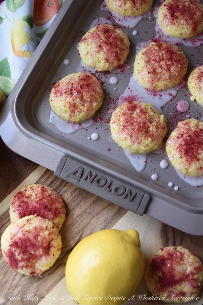 Lemon Raspberry Cake Mix Cookies - Never take a cake mix for granted. Not only are they easy to use, but you can make a myriad of other desserts with them, including these soft, moist, and lemony cake mix cookies. After being drizzled with a lemony glaze and dusted with dried raspberries, these delicious cookies are pretty much impossible to resist. Try them for yourself and see.