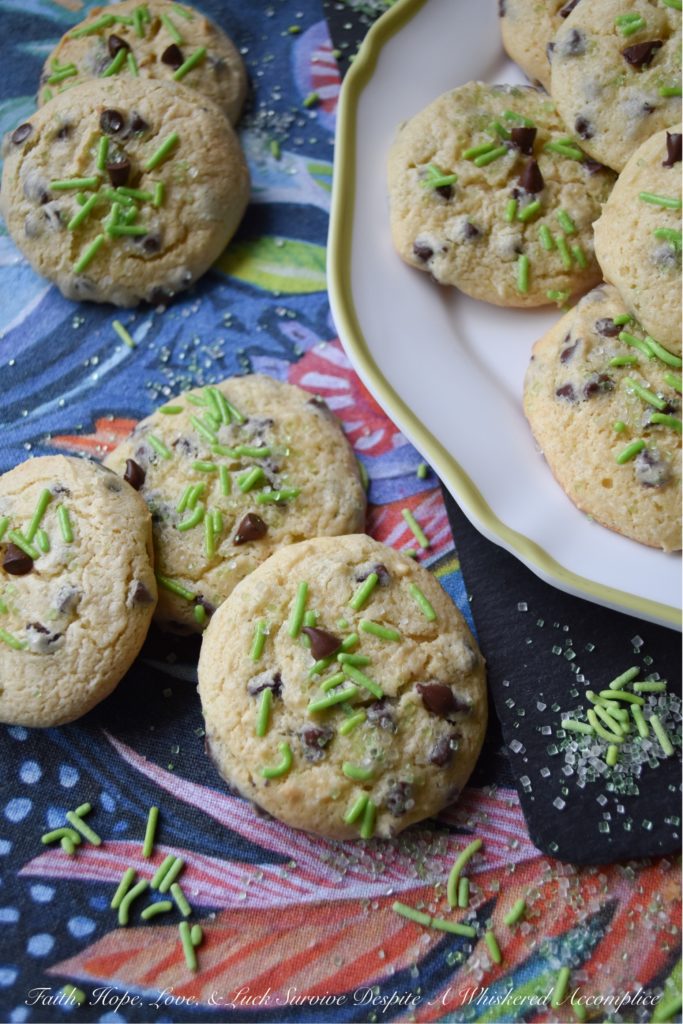 Baileys Cake Mix Chocolate Chip Cookies - Homemade cookies are only one boxed cake mix away, thanks to these chocolate chip cookies, made using Baileys Irish Cream and a few other simple ingredients. Trust me, you're definitely going to want to put a box of white cake mix and a bag of miniature semi-sweet chocolate chips on your grocery list before St. Patrick's Day.