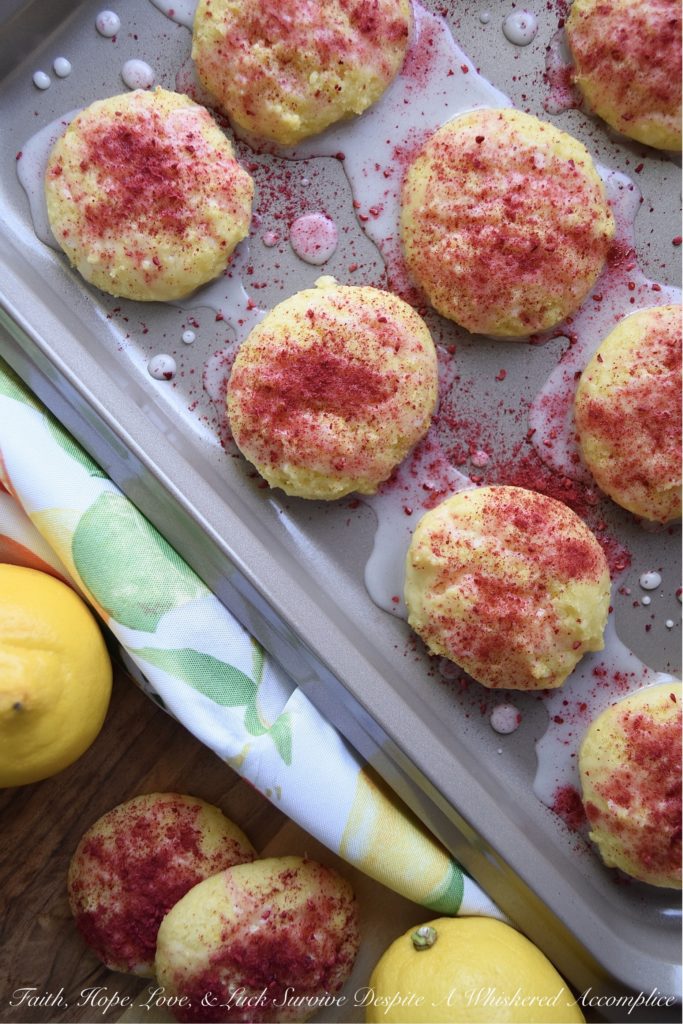 Lemon Raspberry Cake Mix Cookies - Never take a cake mix for granted. Not only are they easy to use, but you can make a myriad of other desserts with them, including these soft, moist, and lemony cake mix cookies. After being drizzled with a lemony glaze and dusted with dried raspberries, these delicious cookies are pretty much impossible to resist. Try them for yourself and see.