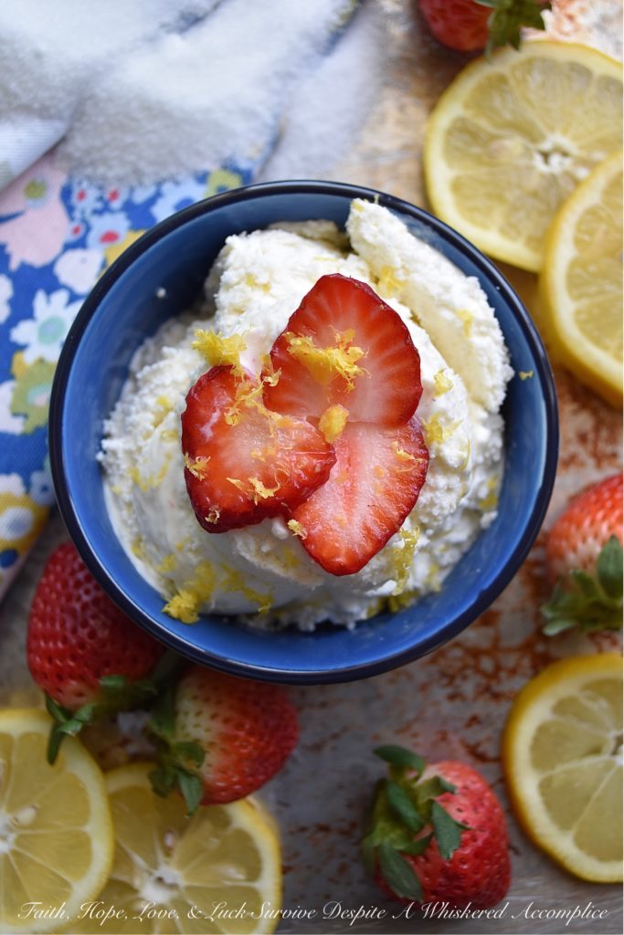 Lemon Cheesecake Ice Cream with Strawberries - You're just seven ingredients away from the best lemony cheesecake ice cream you've ever tasted. The secret? Fresh lemon juice and zest, heavy whipping cream, cream cheese, sugar, vanilla, and a touch of salt. And, to top things off, a few freshly sliced strawberries. Because every lemony dessert tastes just a little bit better with fresh fruit, am I right?