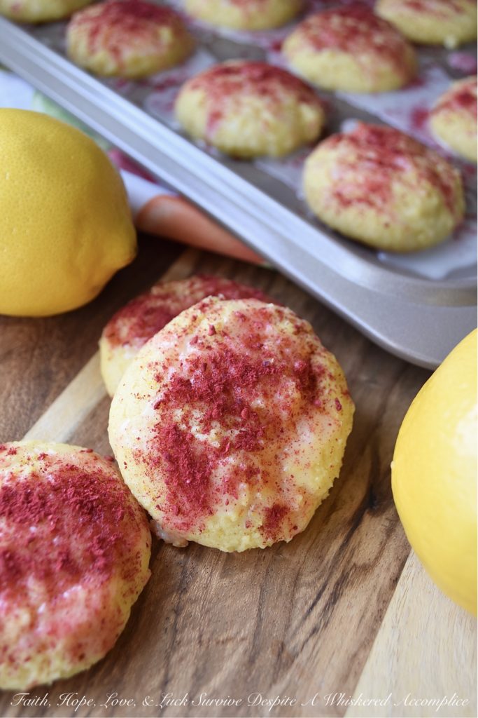 Lemon Raspberry Cake Mix Cookies - Never take a cake mix for granted. Not only are they easy to use, but you can make a myriad of other desserts with them, including these soft, moist, and lemony cake mix cookies. After being drizzled with a lemony glaze and dusted with dried raspberries, these delicious cookies are pretty much impossible to resist. Try them for yourself and see.