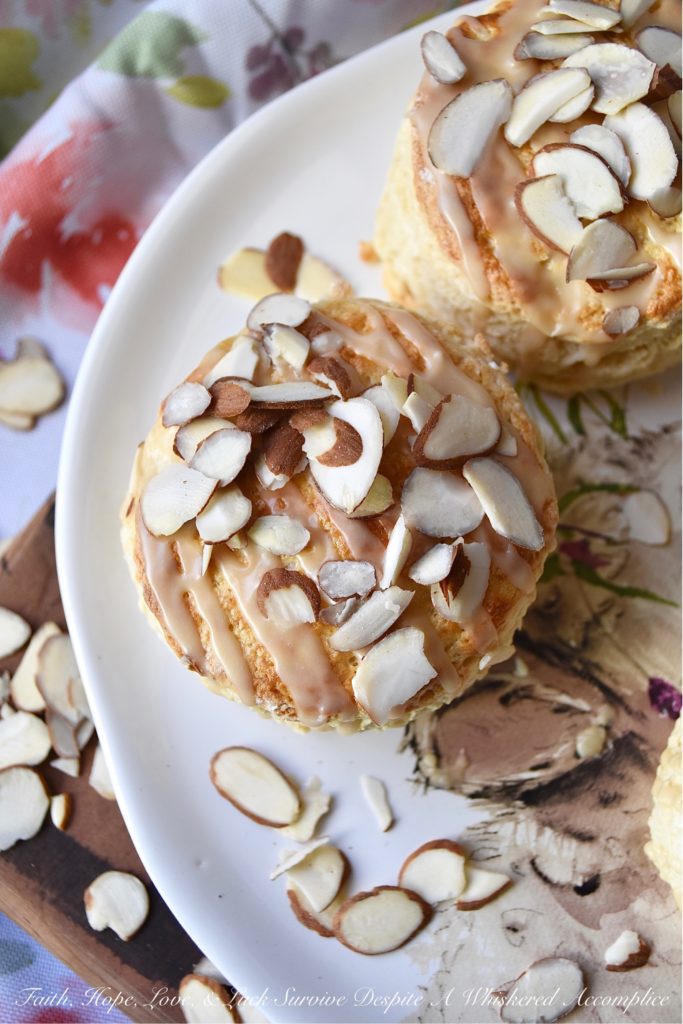 Baileys Irish Cream Almond Scones - A little bit of Baileys Irish Cream and a few sliced almonds give these traditional English scones an extra delicious dose of flavor. It won't matter what time of day you choose to enjoy them, they're a sweet boozy treat you'll always enjoy, whether it be for breakfast, tea, or dessert.