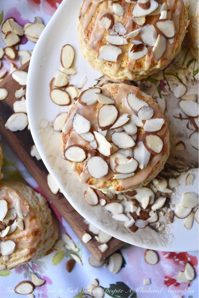 Baileys Irish Cream Almond Scones - A little bit of Baileys Irish Cream and a few sliced almonds give these traditional English scones an extra delicious dose of flavor. It won't matter what time of day you choose to enjoy them, they're a sweet boozy treat you'll always enjoy, whether it be for breakfast, tea, or dessert.
