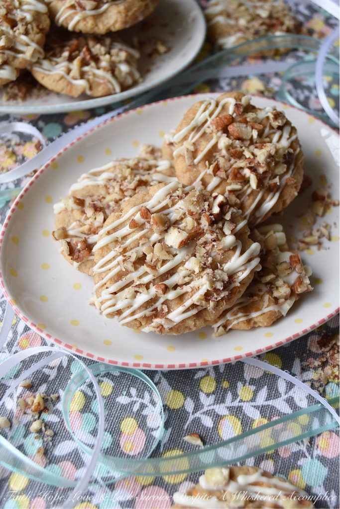 White Chocolate Carrot Cake Tea Cookies - Nothing says spring more than carrot cake. It's one dessert that seems to pop up every year when the trees begin to bloom and Easter approaches. This year, instead of making a traditional carrot cake, try making these tea cookies instead. These cookies are a convenient single-serving dessert with all of the cinnamon, pecan, and white chocolate flavors you've come to love.