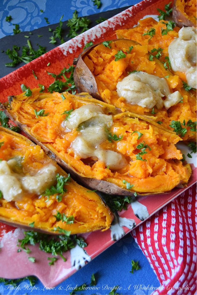 Maple & Honey Butter Crockpot Sweet Potatoes - After making sweet potatoes in a crockpot or slow cooker, you may never make them any other way. They are perfectly tender and ready to top with your favorite fixings after only six hands-off hours of slow cooking. In this simple recipe, these sweet potatoes are topped with a sweet and flavorful homemade butter infused with maple and butter.
