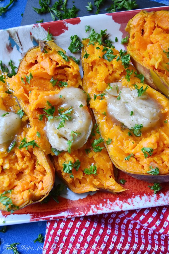 Maple & Honey Butter Crockpot Sweet Potatoes - After making sweet potatoes in a crockpot or slow cooker, you may never make them any other way. They are perfectly tender and ready to top with your favorite fixings after only six hands-off hours of slow cooking. In this simple recipe, these sweet potatoes are topped with a sweet and flavorful homemade butter infused with maple and butter.