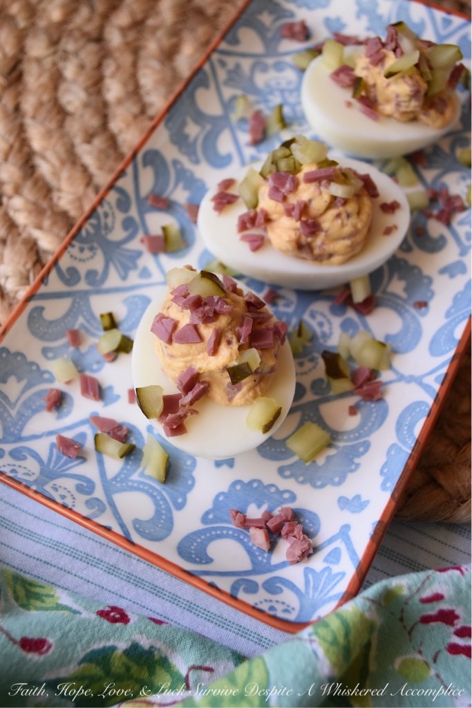 Corned Beef (Lunch Meat) Irish Deviled Eggs - Deviled eggs aren't just for Easter. These particular ones are for St. Patrick's Day. A little bit of seasoning, a few dill pickles, and a wee bit of very finely chopped corned beef lunch meat definitely help give these traditional deviled eggs an Irish flair. They're so fantastic, you may just decide that they don't even require a holiday to enjoy them.