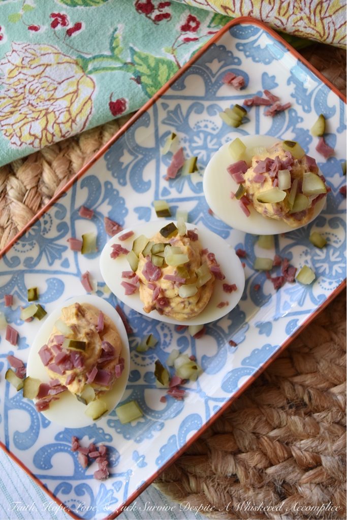 Corned Beef (Lunch Meat) Irish Deviled Eggs - Deviled eggs aren't just for Easter. These particular ones are for St. Patrick's Day. A little bit of seasoning, a few dill pickles, and a wee bit of very finely chopped corned beef lunch meat definitely help give these traditional deviled eggs an Irish flair. They're so fantastic, you may just decide that they don't even require a holiday to enjoy them.