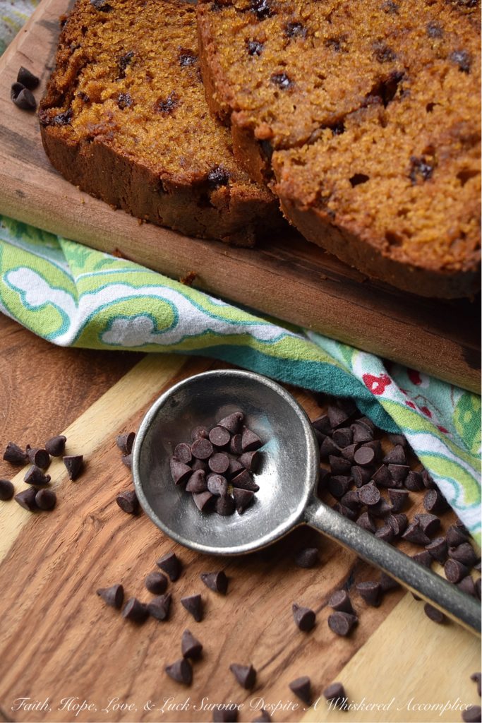 Chocolate Chip Pumpkin Bread Breakfast Loaf - Have you ever opened a can of pumpkin and found yourself not using the entire can in a recipe? What do you do with the leftover pumpkin? Make pumpkin bread, of course. A soft, moist, and sweet breakfast pumpkin bread loaf, studded with miniature semi-sweet chocolate chips. Add a banana and a cup of tea or coffee and breakfast is served.
