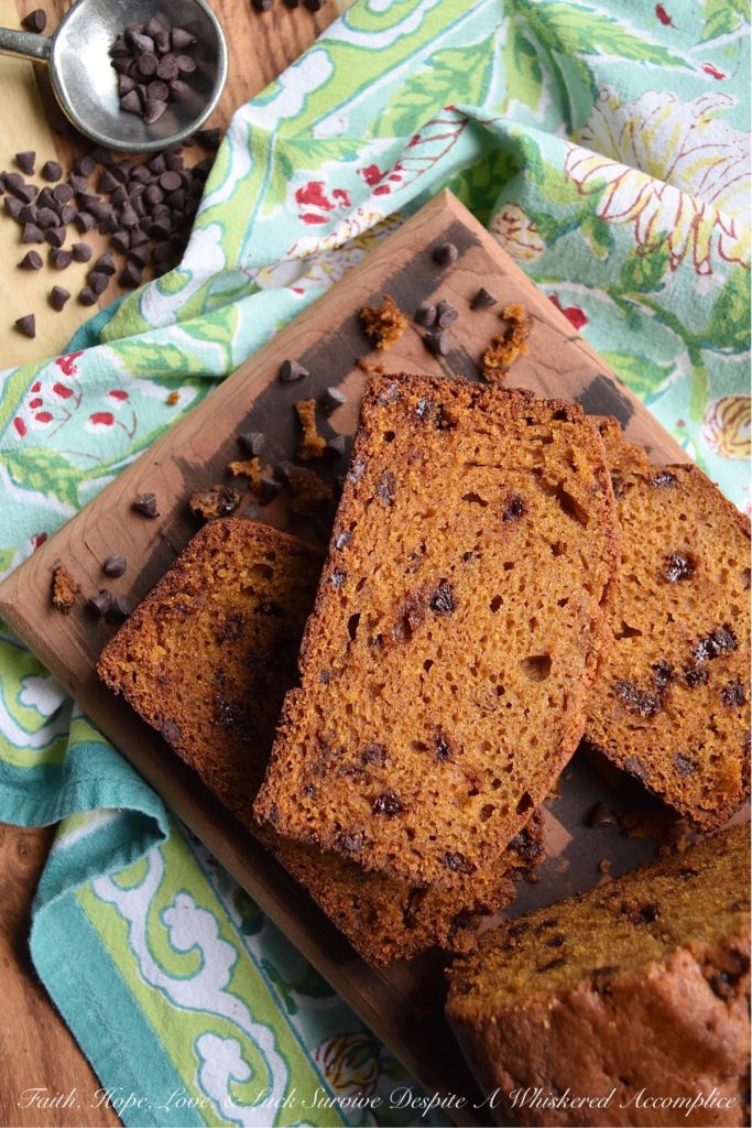 Chocolate Chip Pumpkin Bread Breakfast Loaf - Have you ever opened a can of pumpkin and found yourself not using the entire can in a recipe? What do you do with the leftover pumpkin? Make pumpkin bread, of course. A soft, moist, and sweet breakfast pumpkin bread loaf, studded with miniature semi-sweet chocolate chips. Add a banana and a cup of tea or coffee and breakfast is served.