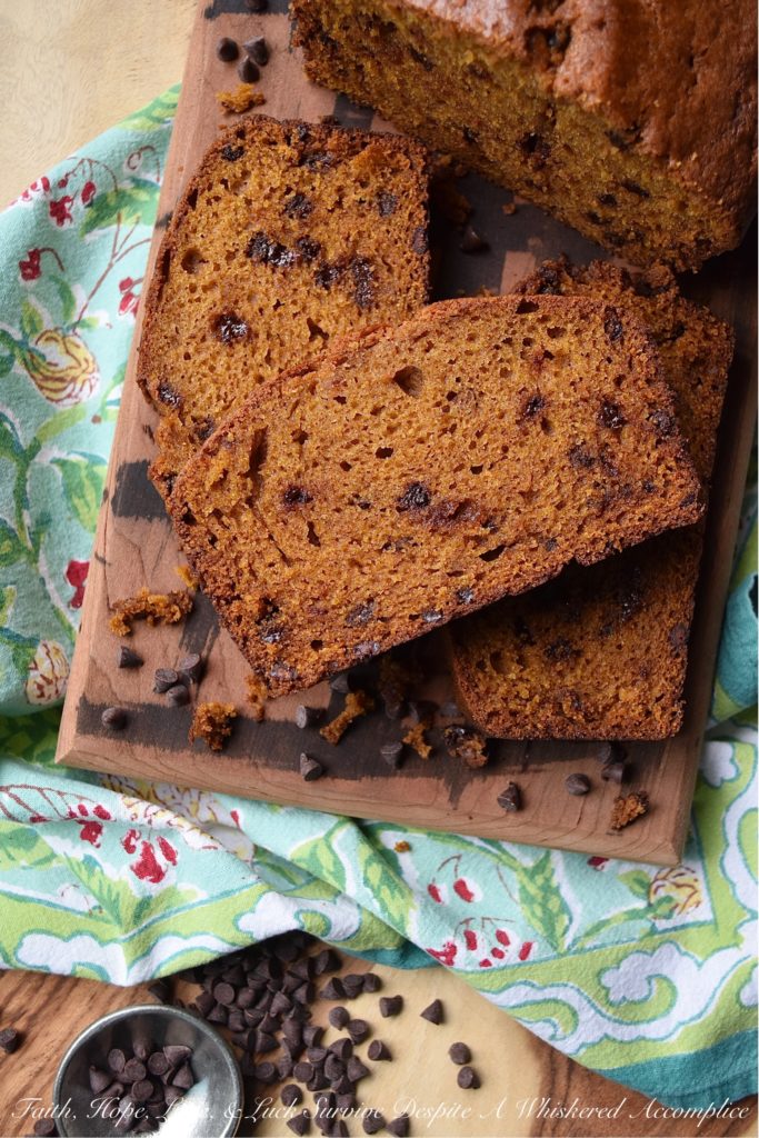 Chocolate Chip Pumpkin Bread Breakfast Loaf - Have you ever opened a can of pumpkin and found yourself not using the entire can in a recipe? What do you do with the leftover pumpkin? Make pumpkin bread, of course. A soft, moist, and sweet breakfast pumpkin bread loaf, studded with miniature semi-sweet chocolate chips. Add a banana and a cup of tea or coffee and breakfast is served.
