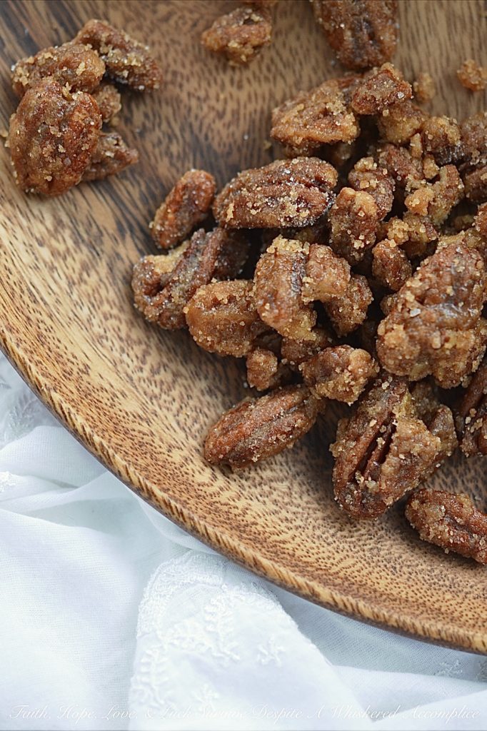 Crockpot Cinnamon Praline Pecans - Praline pecans are perfect as a snack alone, but they also go great in and on baked desserts. This simple crockpot method of cooking them makes them easy to have on any day of the week.