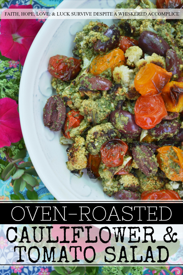 Oven-Roasted Cauliflower & Tomato Salad - Oven-roasted cauliflower and cherry tomatoes are transformed into a Mediterranean summer side salad, by adding homemade basil pesto sauce and kalamata olives. The basil pesto sauce is easy to make by just tossing fresh basil, pumpkin seeds or pepitas, olive oil, red wine vinegar, salt, and pepper into a food processor. This is a simple recipe that really bumps up the flavor of fresh summer produce.