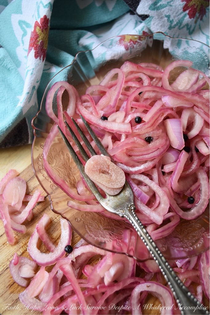 Lime & Beer Pickled Red Onions - Lime and beer, two very simple ingredients. But, when you add them to a very thinly sliced red onion, something absolutely magical happens. You can't help but love these sweet vinegary beer-infused onions. Serve them with your favorite Mexican dishes, such as tacos, quesadillas, fajitas, or even just choose to enjoy them by themselves. No matter how they're served, you're sure to love them.