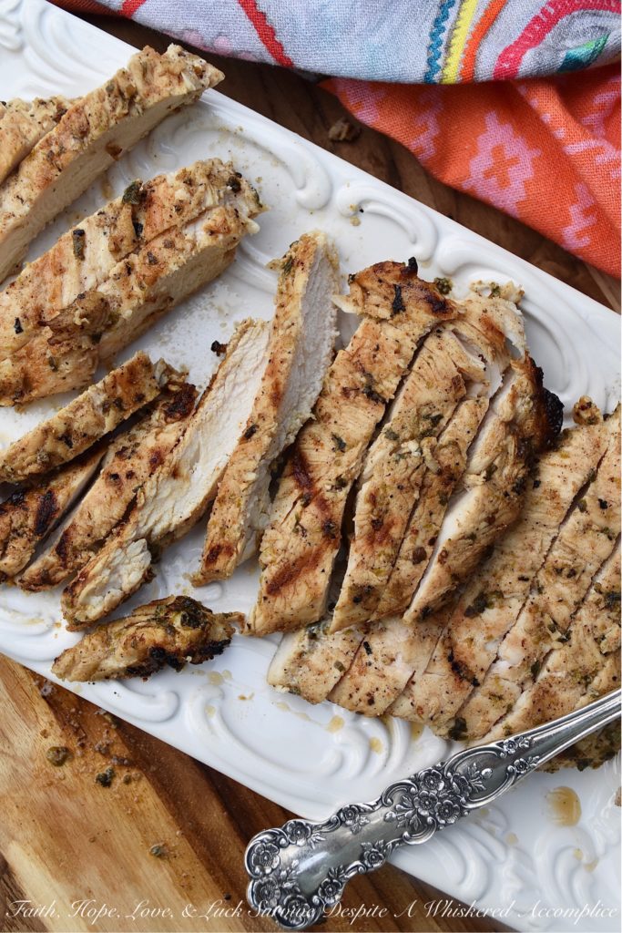 Cilantro & Lime Marinated Grilled Chicken Breasts - Grilled chicken can often be bland, boring, and simply taste like burnt chicken. However, if you add a little best of lime zest and juice, cilantro, and a few other seasonings, and you can turn that dull chicken into something extraordinary. This marinated grilled chicken will win you over for sure.