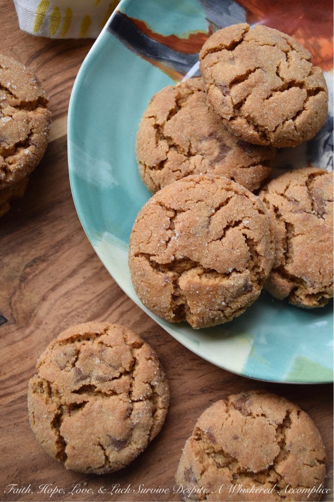Peanut Butter Cup Crackle Cookies - These sweet cookies are similar to your favorite holiday peanut butter crackle cookies, with an added peanut butter and chocolate treat mixed in. I think you'll find that the addition of chopped peanut butter cups helps make this family favorite cookie even better than the classic original.