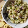 Sweet & Tangy Pineapple Red Onion Salsa - Fresh pineapple and finely diced red onion give this homemade salsa a flavor you won't soon forget. The next time you find yourself craving Mexican food, this is definitely the recipe you need to try. Whether served with chips, alongside fajitas, or on top of tacos, this sweet and tangy salsa will win you over at first bite.