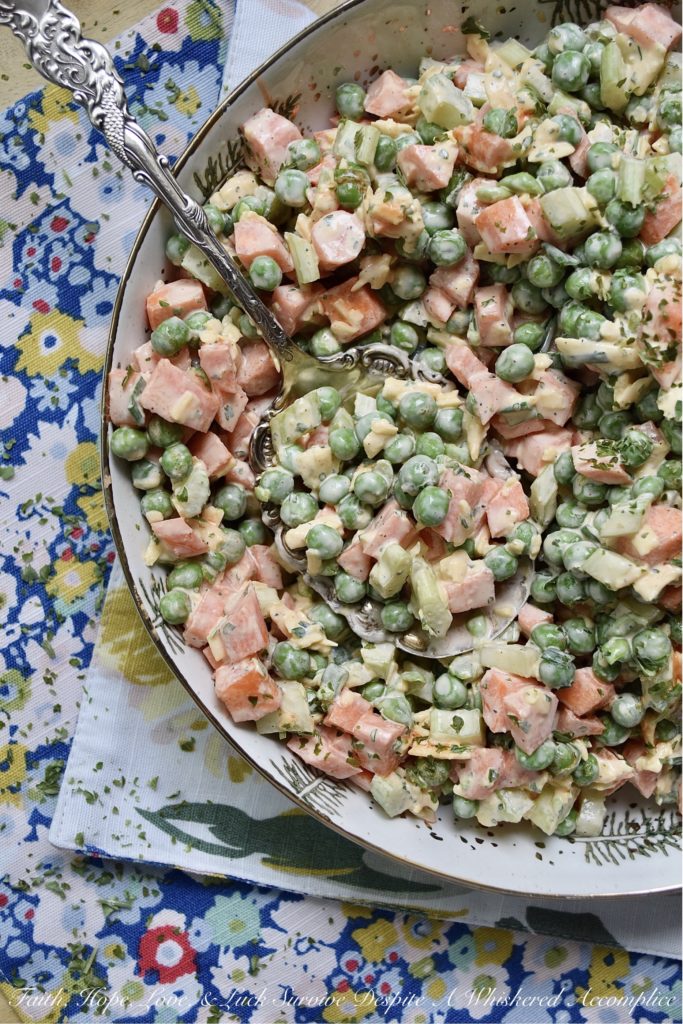 Crunchy Pea Salad with Creamy Buffalo Sauce - If you're a crunchy food superfan, this is one side salad you're definitely going to want to try this summer. Diced celery and carrots give an amazing crunch to this cheesy pea salad. And, once you add in a creamy homemade buffalo sauce made with hot sauce, honey, sour cream, and a few other ingredients, I think that you'll find this pea salad has just as much flavor as it does crunch.