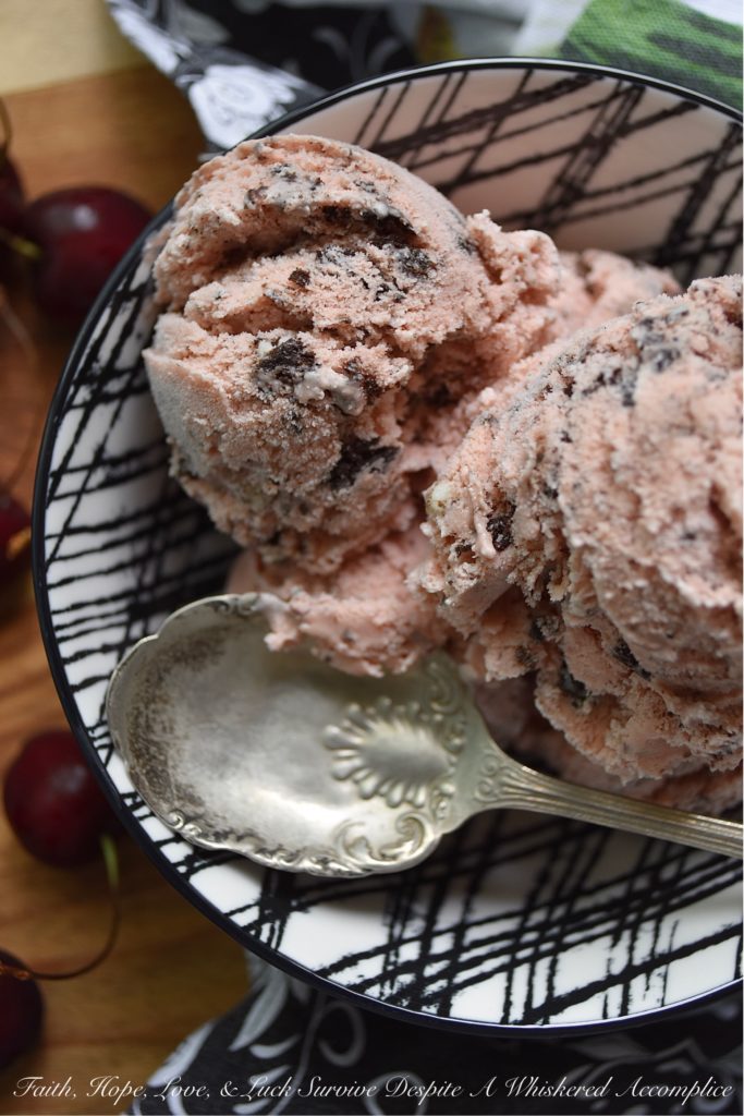 Crushed Oreo Summer Cherry Ice Cream - What's better than cherry ice cream on a hot summer's day? Cherry ice cream, made with fresh sweet cherries and crushed Oreo cookies mixed in. If you love Oreo cookies and you absolutely drool over cherry ice cream, then this is definitely the summer dessert for you.