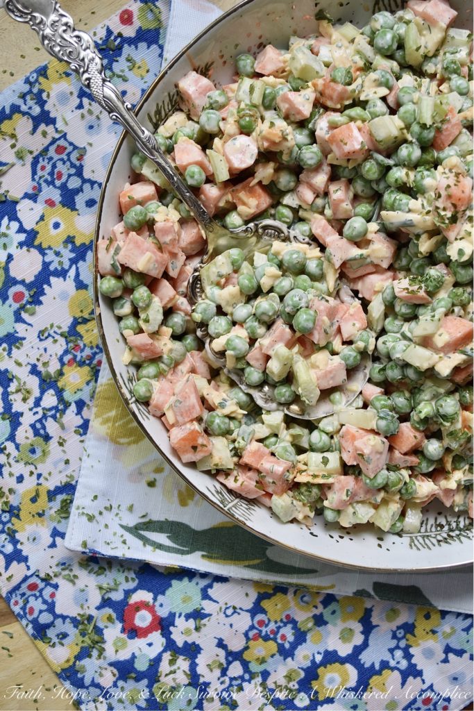 Crunchy Pea Salad with Creamy Buffalo Sauce - If you're a crunchy food superfan, this is one side salad you're definitely going to want to try this summer. Diced celery and carrots give an amazing crunch to this cheesy pea salad. And, once you add in a creamy homemade buffalo sauce made with hot sauce, honey, sour cream, and a few other ingredients, I think that you'll find this pea salad has just as much flavor as it does crunch.