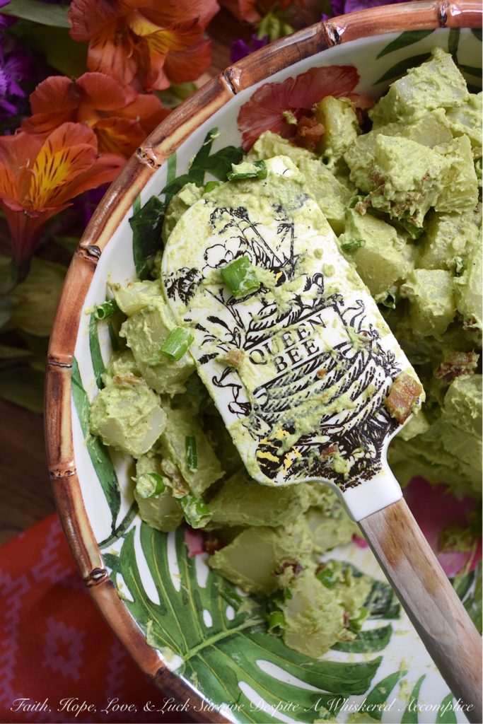 Sour Cream & Scallion Potato Salad with Bacon - This flavorful potato salad gets its vibrant green color from three bunches of chopped and blended scallions. Add in a dressing made with both sour cream and mayonnaise, as well as a healthy dose of crispy crumbled bacon, and you've got a potato salad your entire family will swoon over. If you're searching for a new and unique potato salad recipe, that's just a little bit different than your everyday recipe, this is definitely it.