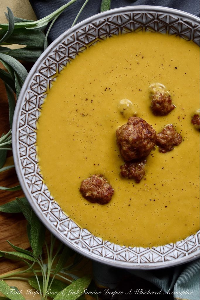 Pumpkin Ale Soup with Pork Eyeball Meatballs - This festive and frighteningly vibrant orange pumpkin ale soup is the perfect treat for Halloween night. It's horrifyingly easy to make, and after being blended, it's alarmingly creamy and spine-chillingly flavorful. Add in a few baked pork eyeball meatballs, and you've got a spooktacular dinner that everyone in your family will die for.
