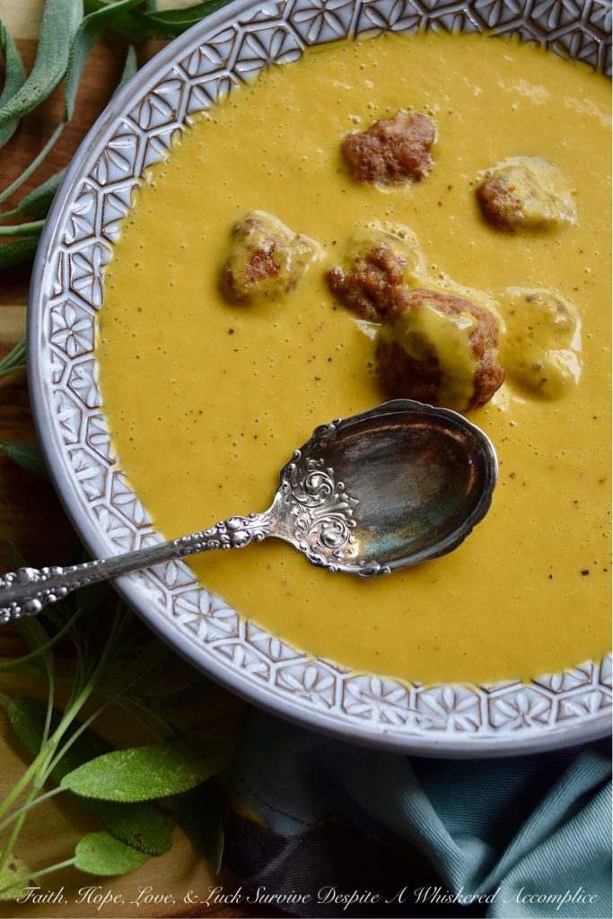 Pumpkin Ale Soup with Pork Eyeball Meatballs - This festive and frighteningly vibrant orange pumpkin ale soup is the perfect treat for Halloween night. It's horrifyingly easy to make, and after being blended, it's alarmingly creamy and spine-chillingly flavorful. Add in a few baked pork eyeball meatballs, and you've got a spooktacular dinner that everyone in your family will die for.