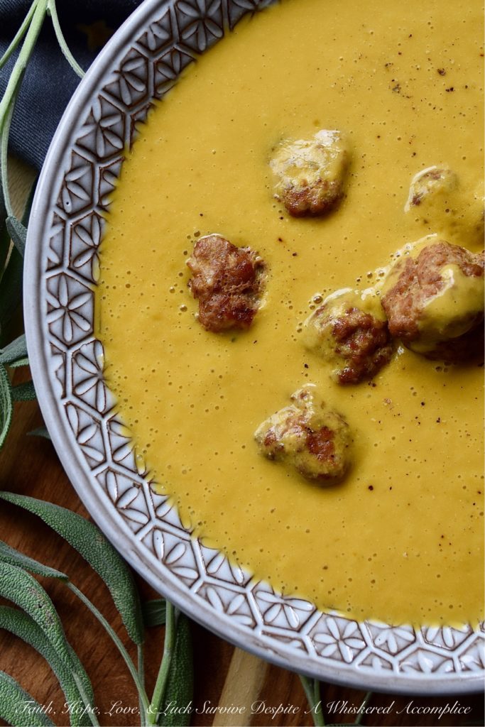 Pumpkin Ale Soup with Pork Eyeball Meatballs - This festive and frighteningly vibrant orange pumpkin ale soup is the perfect treat for Halloween night. It's horrifyingly easy to make, and after being blended, it's alarmingly creamy and spine-chillingly flavorful. Add in a few baked pork eyeball meatballs, and you've got a spooktacular dinner that everyone in your family will die for.