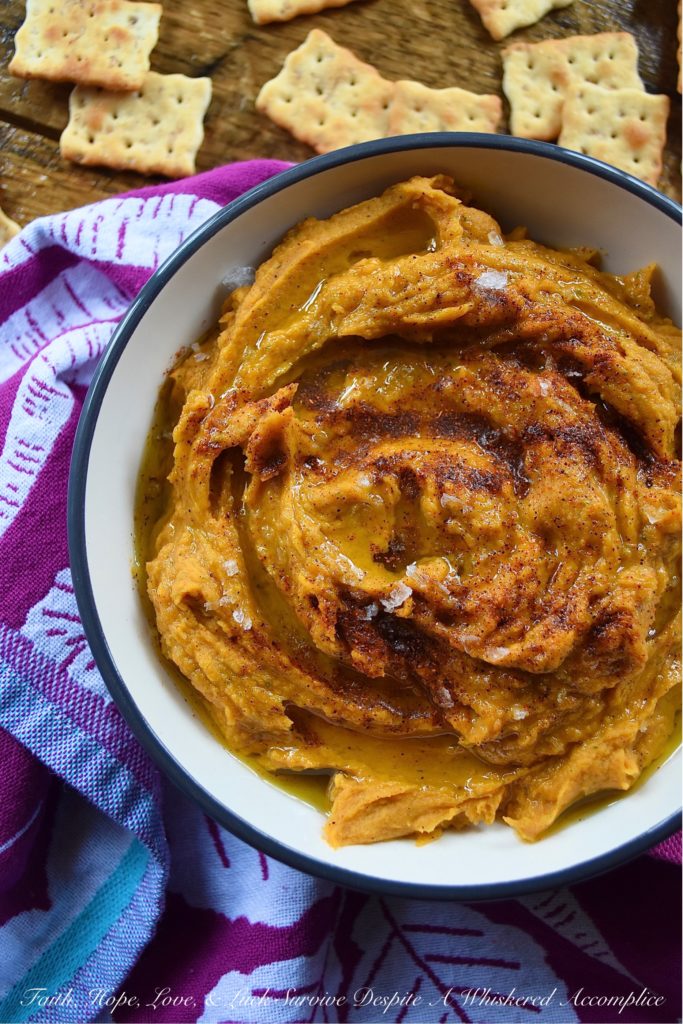 Lemony Chili Roasted Sweet Potato Hummus - Looking for a healthy appetizer recipe with tons of flavor? Instead of snacking on traditional garbanzo bean or chickpea hummus, why not liven it up with the addition of a roasted sweet potato? A little bit of chili powder and fresh lemon juice help to balance everything out, with just a touch of honey for sweetness. You'll definitely love dipping crackers, bread, or even fresh vegetables into this delicious lemony hummus.