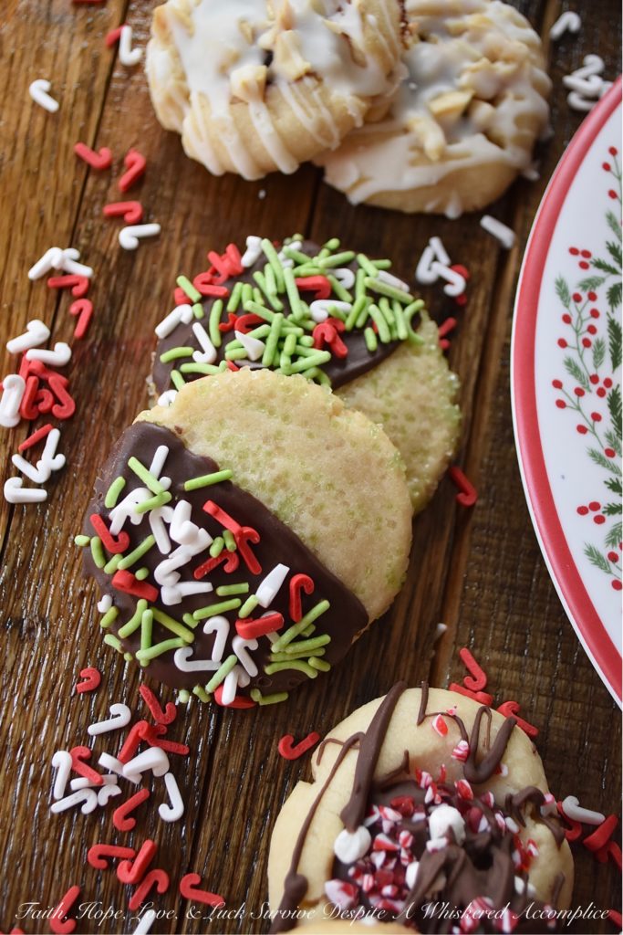 5 Christmas Cookies – 1 Batch of Cookie Dough - Around the holidays, it's always nice to have a cookie tray or platter around when you are entertaining guests. However, it's not always easy or convenient to bake several batches of cookies in order to have that cookie tray or platter on hand. With this 5 in 1 cookie recipe, you can turn one batch of cookie dough into five different and absolutely delicious Christmas cookies. It's a fun way to make a gorgeous cookie tray, without having to spend hours in the kitchen baking.