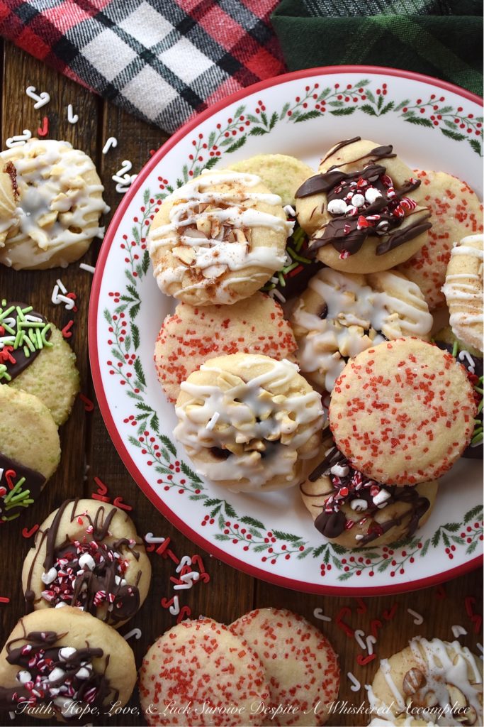 5 Christmas Cookies – 1 Batch of Cookie Dough - Around the holidays, it's always nice to have a cookie tray or platter around when you are entertaining guests. However, it's not always easy or convenient to bake several batches of cookies in order to have that cookie tray or platter on hand. With this 5 in 1 cookie recipe, you can turn one batch of cookie dough into five different and absolutely delicious Christmas cookies. It's a fun way to make a gorgeous cookie tray, without having to spend hours in the kitchen baking.