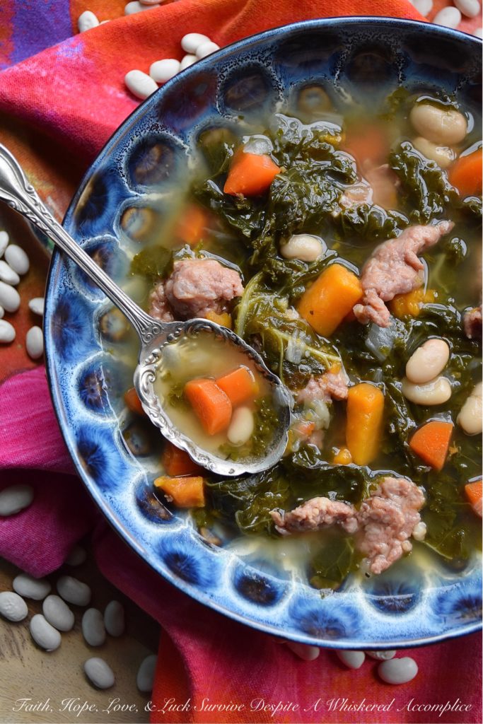 One-Pot Italian Sausage, Kale, & Bean Soup - There's nothing better than a healthy, comforting, and absolutely delicious bowl of soup on a cold winter's day. And, when you make that soup using only one pot, things get even better. This one-pot soup, made with Italian sausage, kale, & beans, will easily become one of your go-to winter soup recipes.