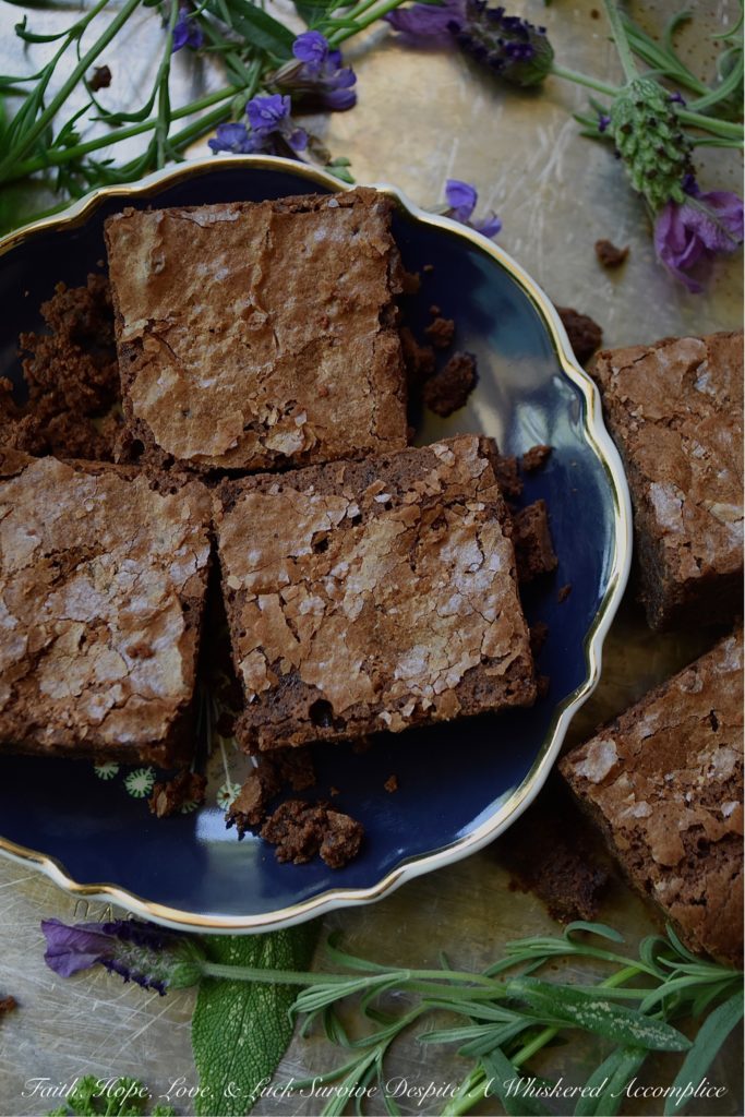 Dark Chocolate Irish Cream Brownies - There's absolutely nothing wrong with a homemade chocolaty fudge brownie. However, sometimes you just need to switch things up and add a boozy little twist to make things even better. These particular dark chocolate brownies have just the right amount of Irish cream to make them simply irresistible. So, grab that bottle of Baileys, and let's get baking.
