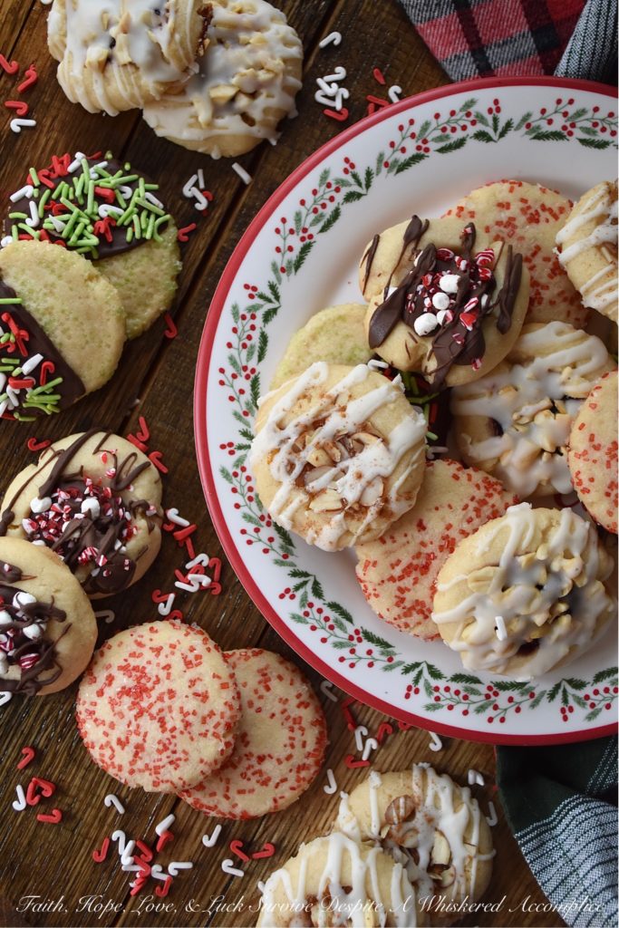5 Christmas Cookies – 1 Batch of Cookie Dough - Around the holidays, it's always nice to have a cookie tray or platter around when you are entertaining guests. However, it's not always easy or convenient to bake several batches of cookies in order to have that cookie tray or platter on hand. With this 5 in 1 cookie recipe, you can turn one batch of cookie dough into five different and absolutely delicious Christmas cookies. It's a fun way to make a gorgeous cookie tray, without having to spend hours in the kitchen baking.