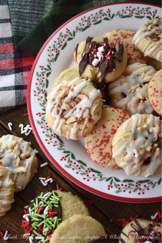 5 Christmas Cookies – 1 Batch of Cookie Dough - Around the holidays, it's always nice to have a cookie tray or platter around when you are entertaining guests. However, it's not always easy or convenient to bake several batches of cookies in order to have that cookie tray or platter on hand. With this 5 in 1 cookie recipe, you can turn one batch of cookie dough into five different and absolutely delicious Christmas cookies. It's a fun way to make a gorgeous cookie tray, without having to spend hours in the kitchen baking.