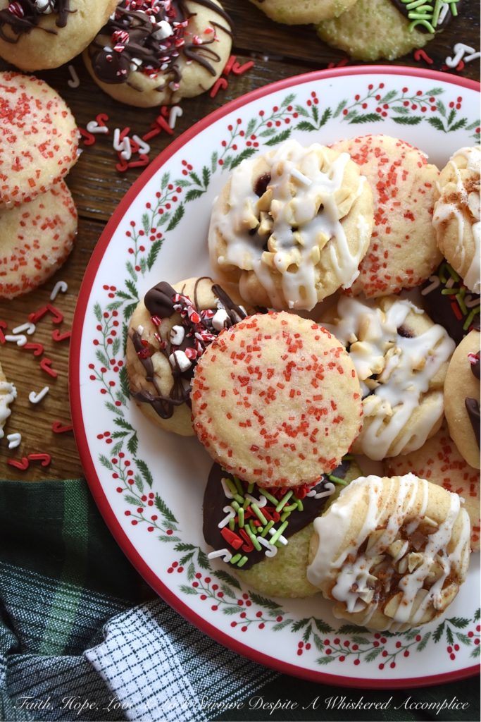 5 Christmas Cookies – 1 Batch of Cookie Dough - Around the holidays, it's always nice to have a cookie tray or platter around when you are entertaining guests. However, it's not always easy or convenient to bake several batches of cookies in order to have that cookie tray or platter on hand. With this 5 in 1 cookie recipe, you can turn one batch of cookie dough into five different and absolutely delicious Christmas cookies. It's a fun way to make a gorgeous cookie tray, without having to spend hours in the kitchen baking.