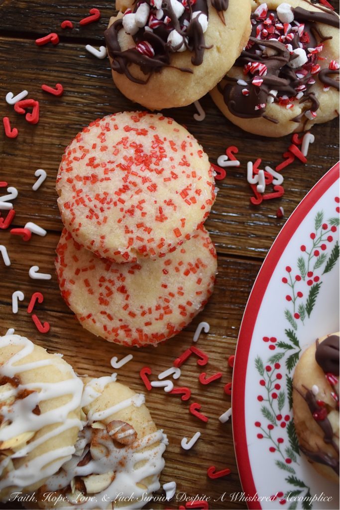 5 Christmas Cookies – 1 Batch of Cookie Dough - Around the holidays, it's always nice to have a cookie tray or platter around when you are entertaining guests. However, it's not always easy or convenient to bake several batches of cookies in order to have that cookie tray or platter on hand. With this 5 in 1 cookie recipe, you can turn one batch of cookie dough into five different and absolutely delicious Christmas cookies. It's a fun way to make a gorgeous cookie tray, without having to spend hours in the kitchen baking.
