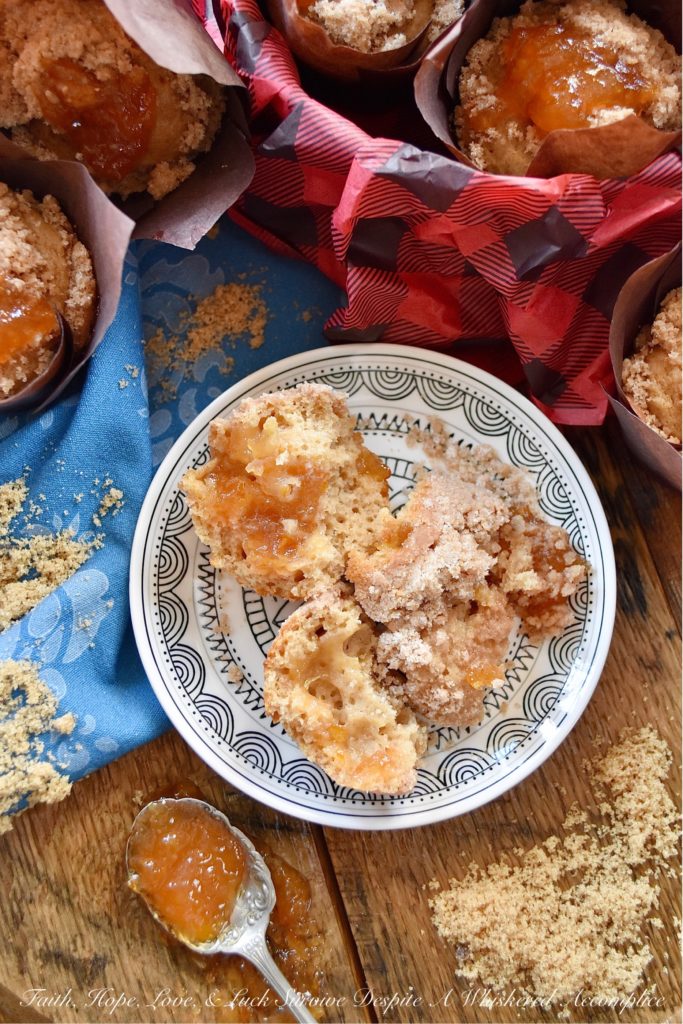 Orange Marmalade Cinnamon Streusel Muffins - What could be better than a streusel-topped muffin for breakfast? A cinnamon-flavored muffin, filled with orange marmalade, topped with a buttery cinnamon sugar streusel, which is then garnished with an additional dollop of orange marmalade. Now that's a muffin worth rolling out of bed for.