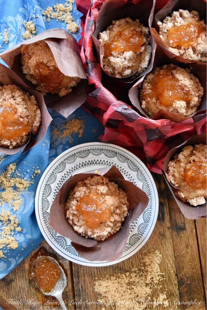 Orange Marmalade Cinnamon Streusel Muffins - What could be better than a streusel-topped muffin for breakfast? A cinnamon-flavored muffin, filled with orange marmalade, topped with a buttery cinnamon sugar streusel, which is then garnished with an additional dollop of orange marmalade. Now that's a muffin worth rolling out of bed for.
