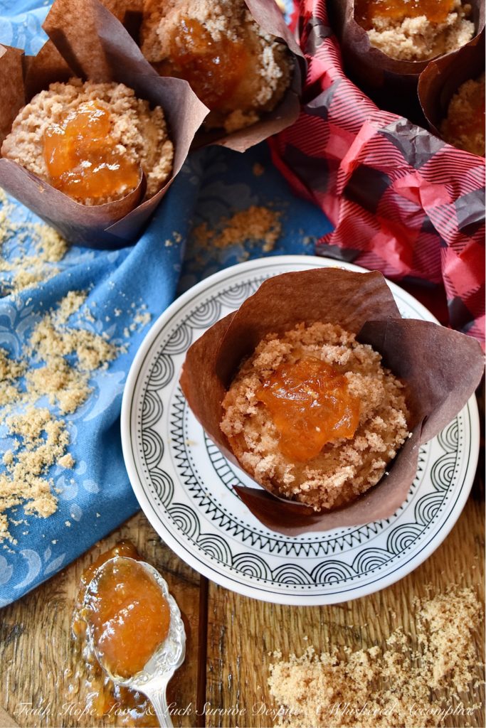 Orange Marmalade Cinnamon Streusel Muffins - What could be better than a streusel-topped muffin for breakfast? A cinnamon-flavored muffin, filled with orange marmalade, topped with a buttery cinnamon sugar streusel, which is then garnished with an additional dollop of orange marmalade. Now that's a muffin worth rolling out of bed for.