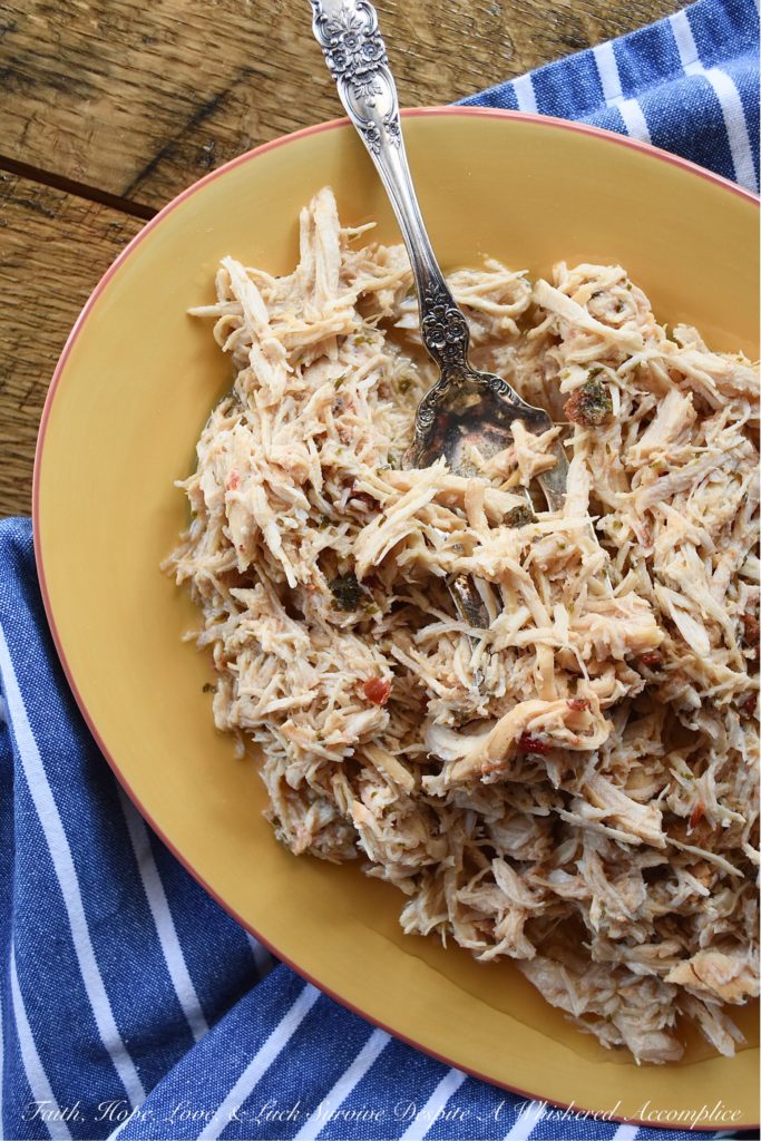 Game Day Crockpot Frozen Chicken Breasts - When it comes to watching football, I think we can all agree that snacks are an absolute necessity. And with this toss-it-all-in, easy, make-ahead crockpot frozen chicken breast recipe, game-day snacks are about to become even tastier. After slow-cooking in a beer and red pepper jelly mixture for four hours, these frozen chicken breasts are shredded and returned to their cooking liquid. You can then use the shredded meat in your favorite tacos, quesadillas, sandwiches, or game day appetizers.