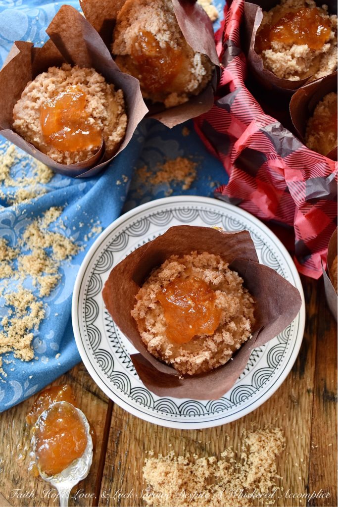 Orange Marmalade Cinnamon Streusel Muffins - What could be better than a streusel-topped muffin for breakfast? A cinnamon-flavored muffin, filled with orange marmalade, topped with a buttery cinnamon sugar streusel, which is then garnished with an additional dollop of orange marmalade. Now that's a muffin worth rolling out of bed for.