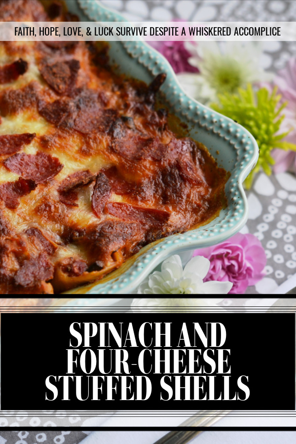 Spinach and Four-Cheese Stuffed Shells - This spinach and four-cheese stuffed shells Italian pasta dish is the perfect recipe to serve for a large family dinner, especially if you're trying to get your family to eat more spinach. After all, it's pretty hard to resist a baked pasta dish, topped with perfectly browned ooey-gooey cheese and crisp pepperoni.