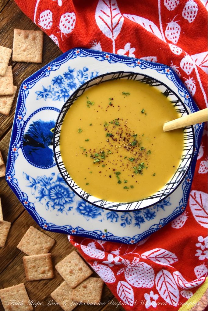 Crockpot Sweet Potato Peanut Butter Curry Soup - It's not often that you can throw a few ingredients into a crockpot or slow-cooker and somehow end up with an amazing recipe. However, with this sweet potato soup recipe, made with sweet curry powder, that definitely happens. The secret to this amazing crockpot soup is blending it with creamy peanut butter after it has been cooked on low heat for several hours. The peanut butter adds richness, creaminess, and just the right amount of nutty flavor.