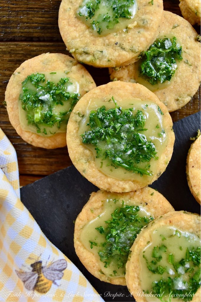 Honey-Kissed Savory Shortbread Crackers - It may seem like a lot of work to make homemade crackers when you can just pick some up at your local market. However, after you've tasted one of these sweet and savory honey-kissed shortbread crackers, I think you'll admit that it's worth every minute of time you spent baking them. They're crispy, cheesy, salty, and have a lovely sweet honey finish. They are basically cracker perfection.