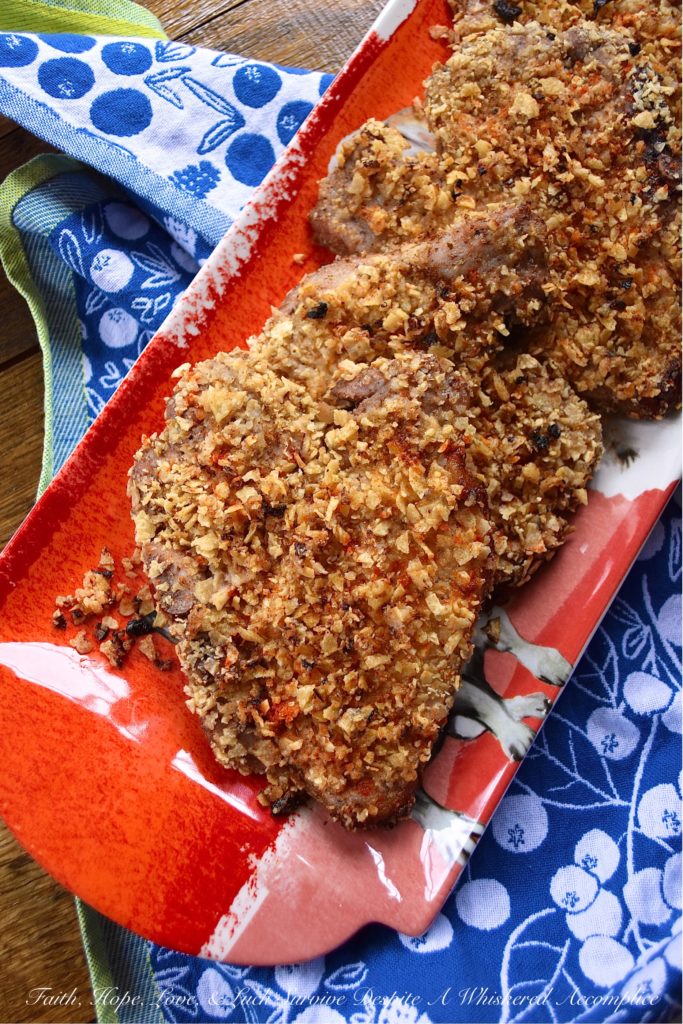 Tortilla Crusted Baked Marinated Pork Chops - We're all looking for a baked pork chop recipe with great flavor. However, more often than not, baked pork chops tend to be dry, rubbery, and disappointing. With this tortilla-crusted marinated pork chop recipe, that won't be a problem. Thanks to the simple overnight marinade, these pork chops come out of the oven super juicy and flavorful. And, the tortilla crust makes them even more amazing.