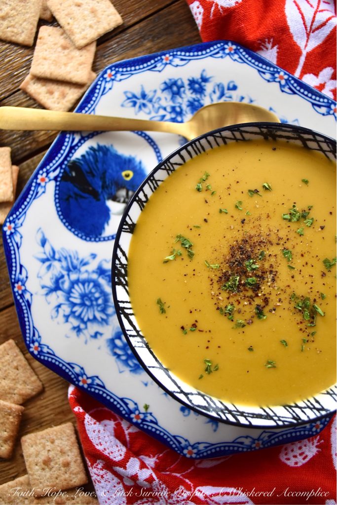Crockpot Sweet Potato Peanut Butter Curry Soup - It's not often that you can throw a few ingredients into a crockpot or slow-cooker and somehow end up with an amazing recipe. However, with this sweet potato soup recipe, made with sweet curry powder, that definitely happens. The secret to this amazing crockpot soup is blending it with creamy peanut butter after it has been cooked on low heat for several hours. The peanut butter adds richness, creaminess, and just the right amount of nutty flavor.